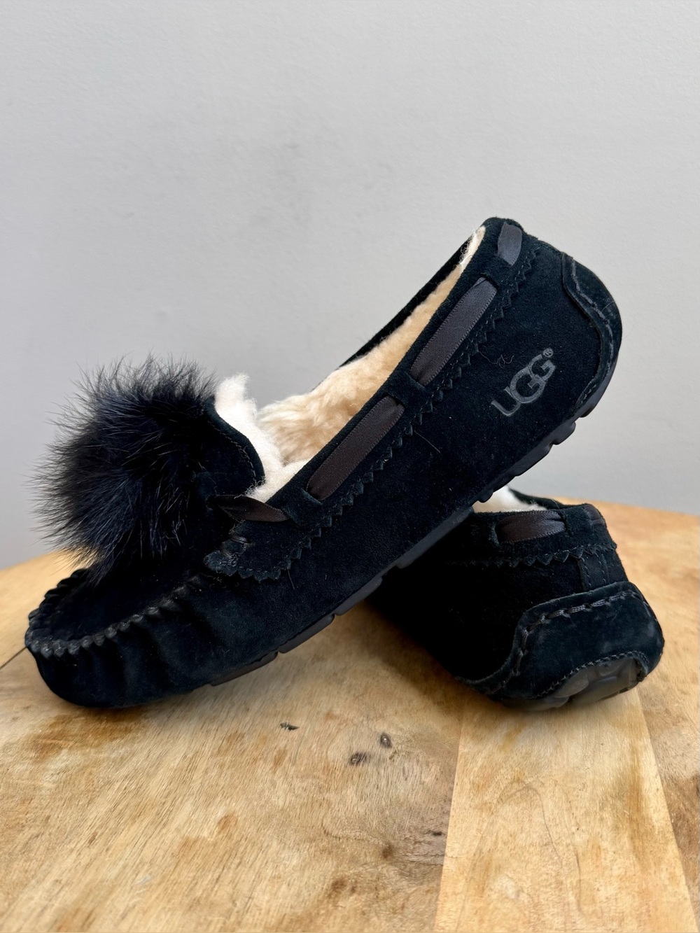 UGG Dakota Black Suede Pom Pom Moccasin Slippers Size 6